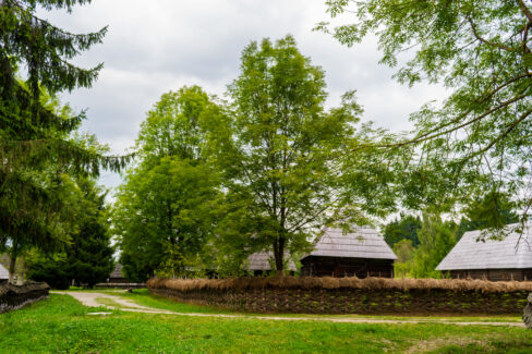 The hay and wood fence in front of Marinca House, Maramures Village Museum, Romania